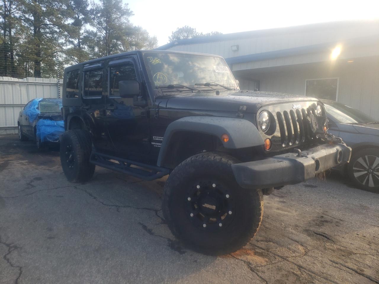 JEEP WRANGLER U 2010 with VIN 1J4BA3H17AL163064 - Photo from auction