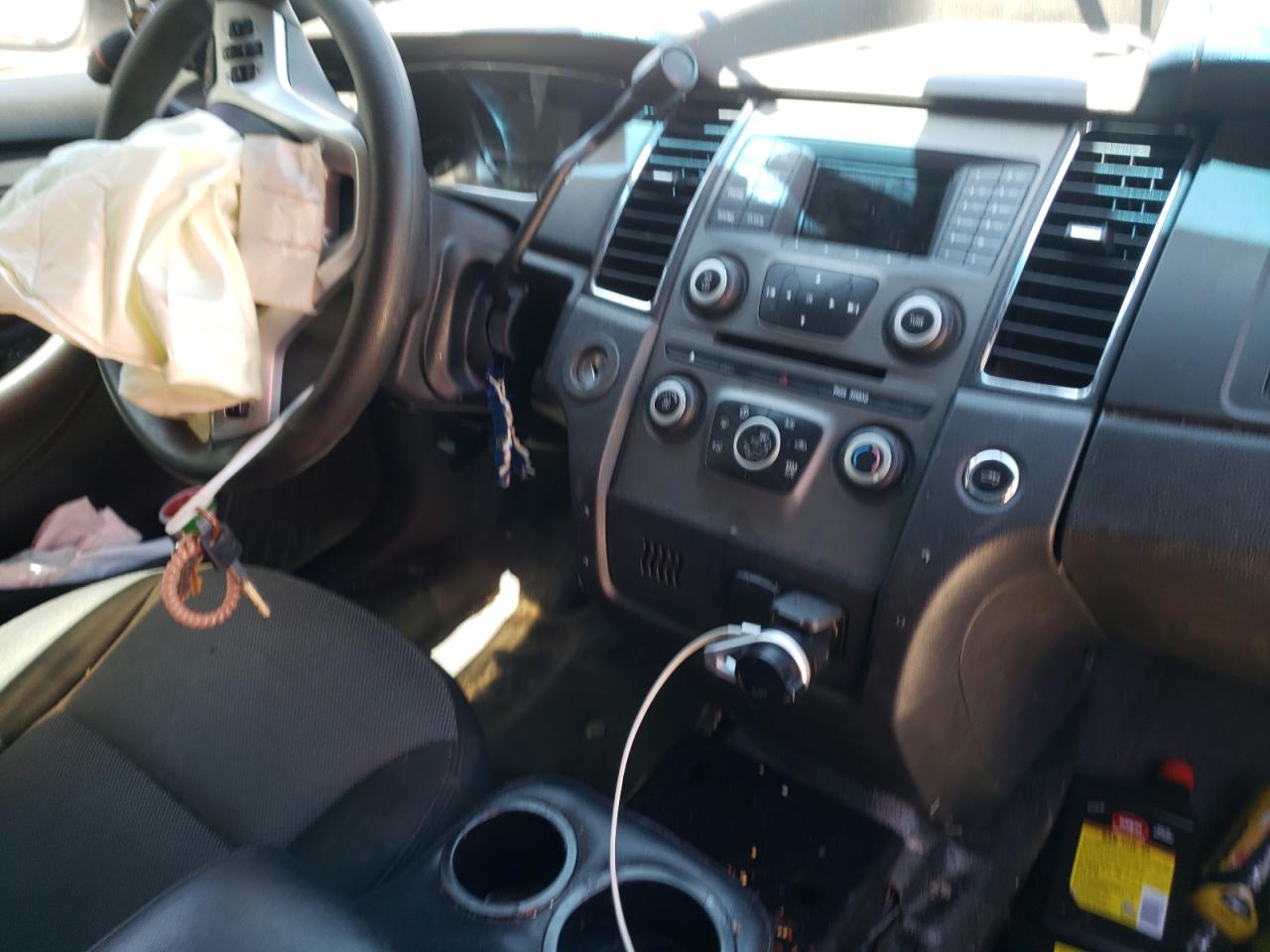 Photo 9 from auction – 2013 FORD TAURUS POL with VIN 1FAHP2M80DG213009