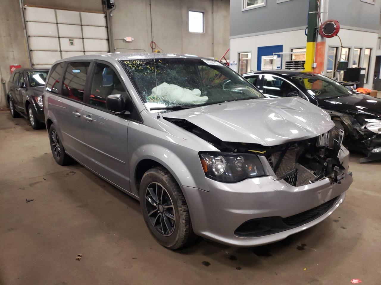 DODGE GRAND CARA 2015 with VIN 2C4RDGBGXFR570228 - Photo from auction