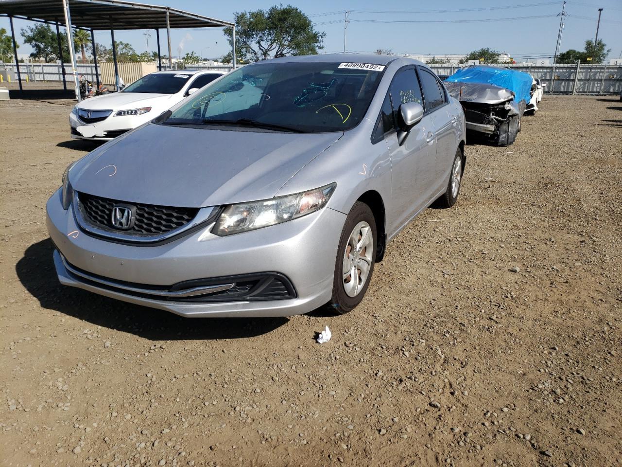 Photo 2 from auction – 2014 HONDA CIVIC LX with VIN 19XFB2F58EE012463