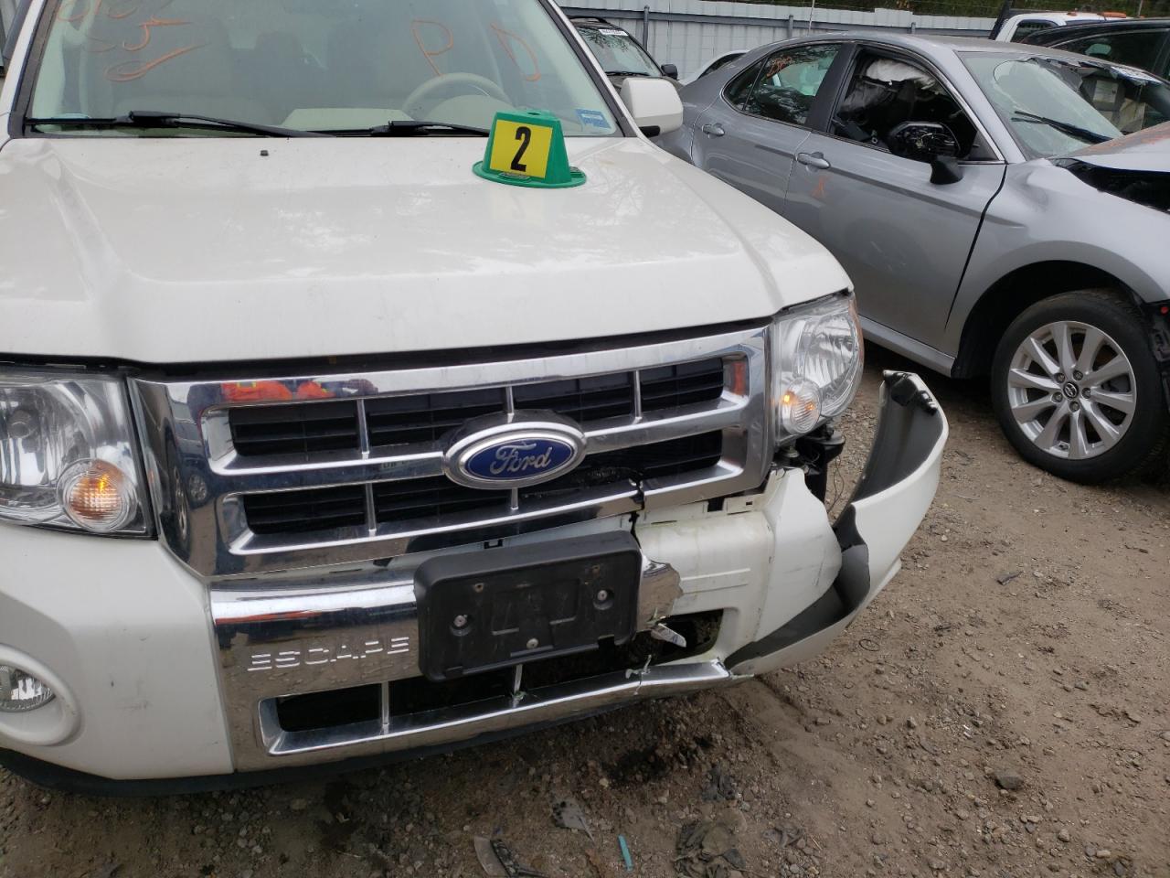 Photo 9 from auction – 2011 FORD ESCAPE LIM with VIN 1FMCU9EG7BKB63033