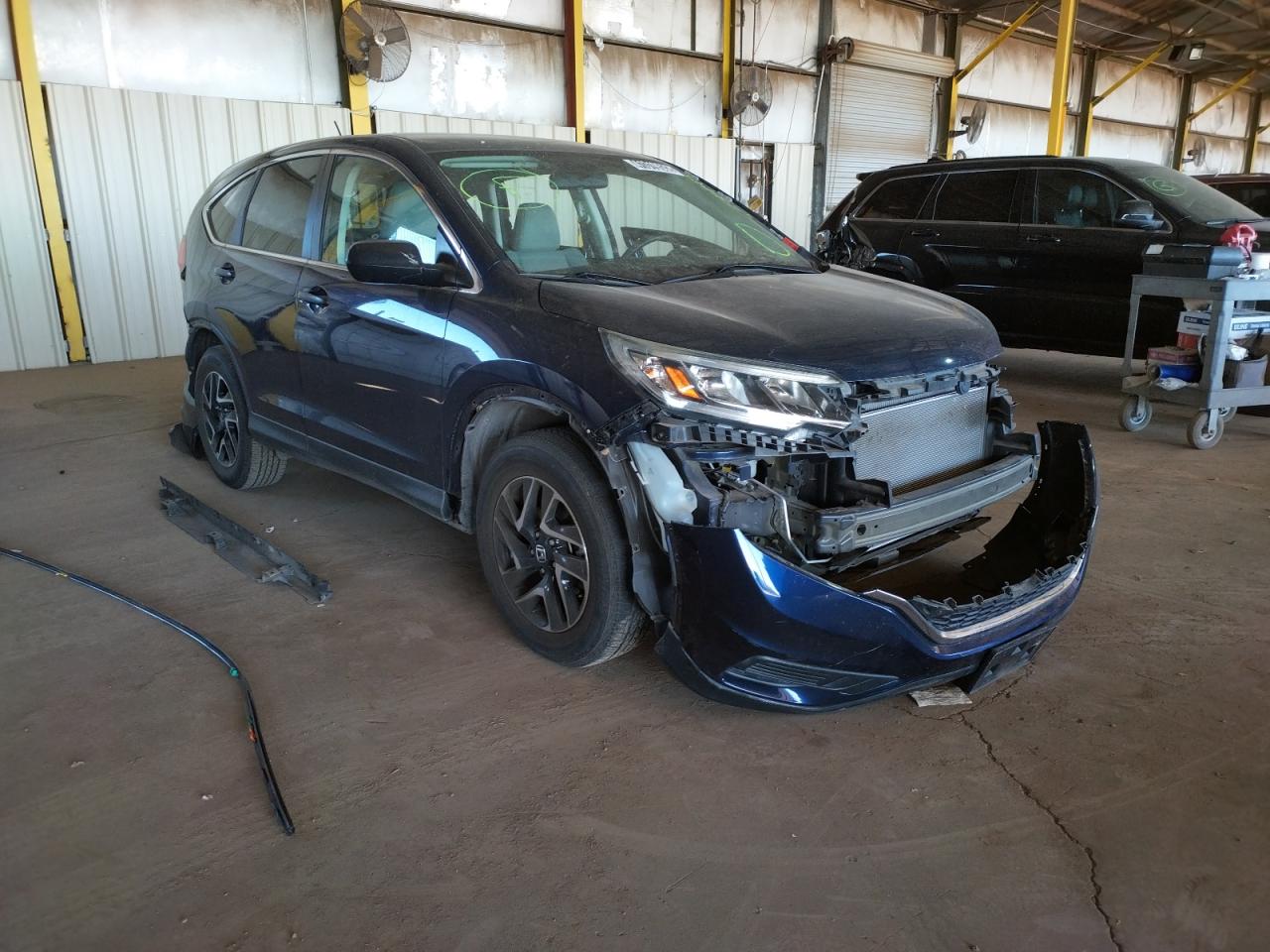 Photo 9 from auction – 2016 HONDA CR-V SE with VIN 5J6RM4H41GL028189