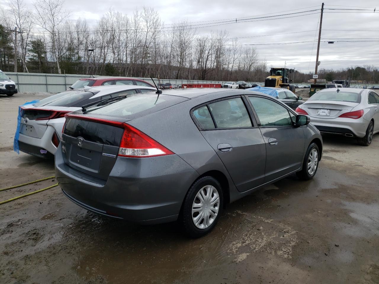 Photo 4 from auction – 2011 HONDA INSIGHT LX with VIN JHMZE2H50BS007914