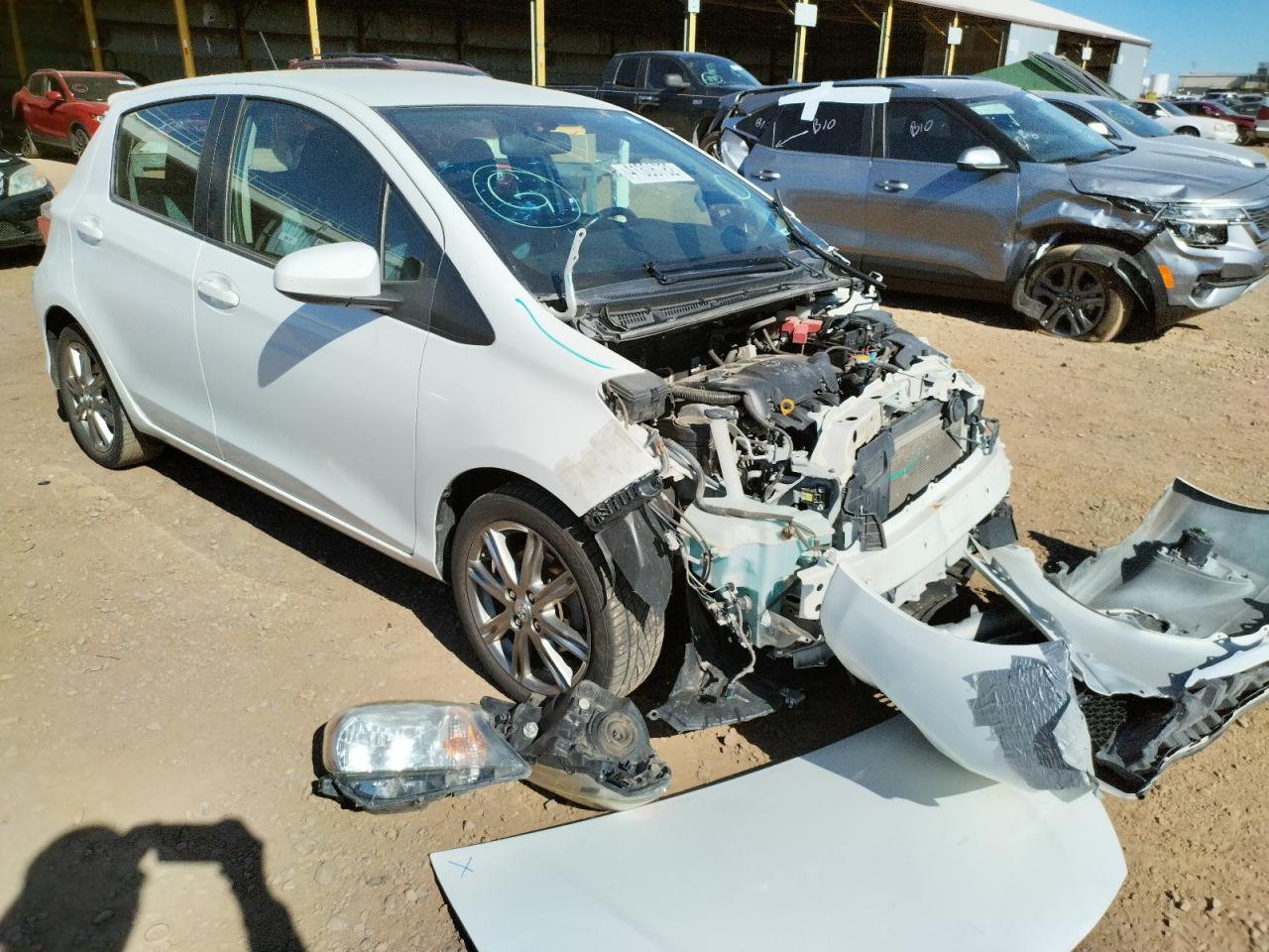 TOYOTA YARIS 2012 with VIN JTDKTUD34CD500297 - Photo from auction