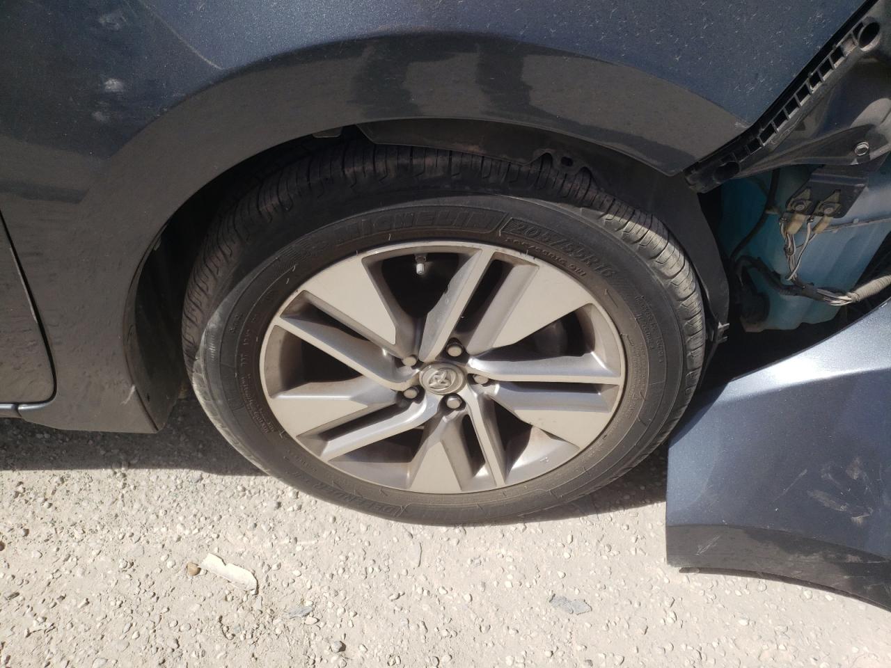 Photo 9 from auction – 2014 TOYOTA COROLLA EC with VIN 5YFBPRHE0EP032971