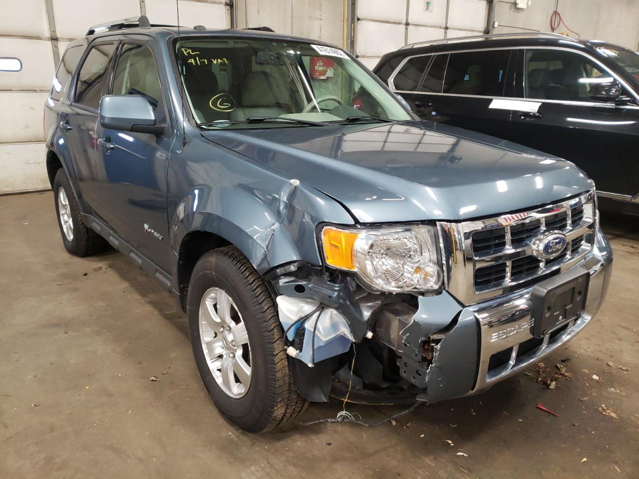 FORD ESCAPE HYB 2010 with VIN 1FMCU5K31AKB91886 - Photo from auction