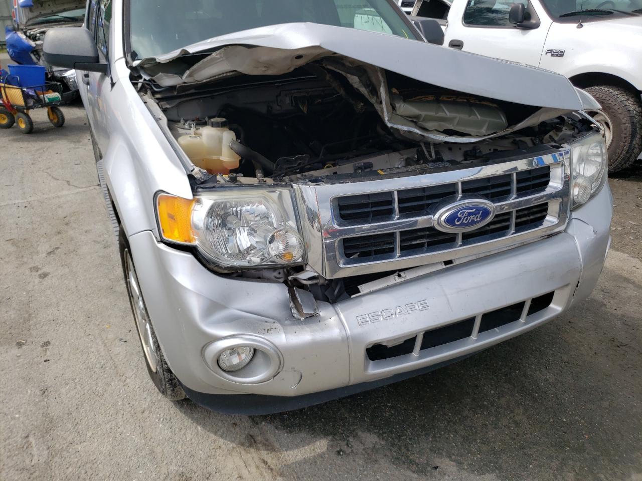 Photo 9 from auction – 2011 FORD ESCAPE XLT with VIN 1FMCU0D76BKC16124