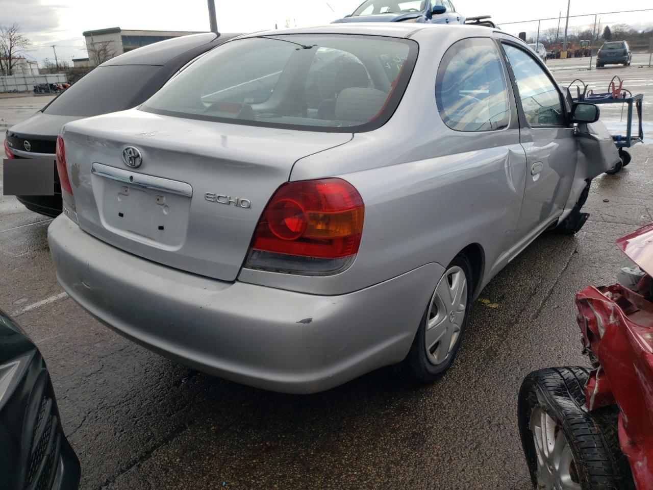 Photo 4 from auction – 2004 TOYOTA ECHO with VIN JTDAT123840328748