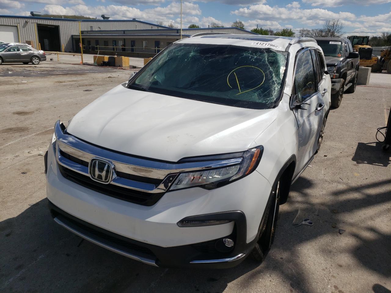 Photo 9 from auction – 2022 HONDA PILOT TOUR with VIN 5FNYF5H98NB004680