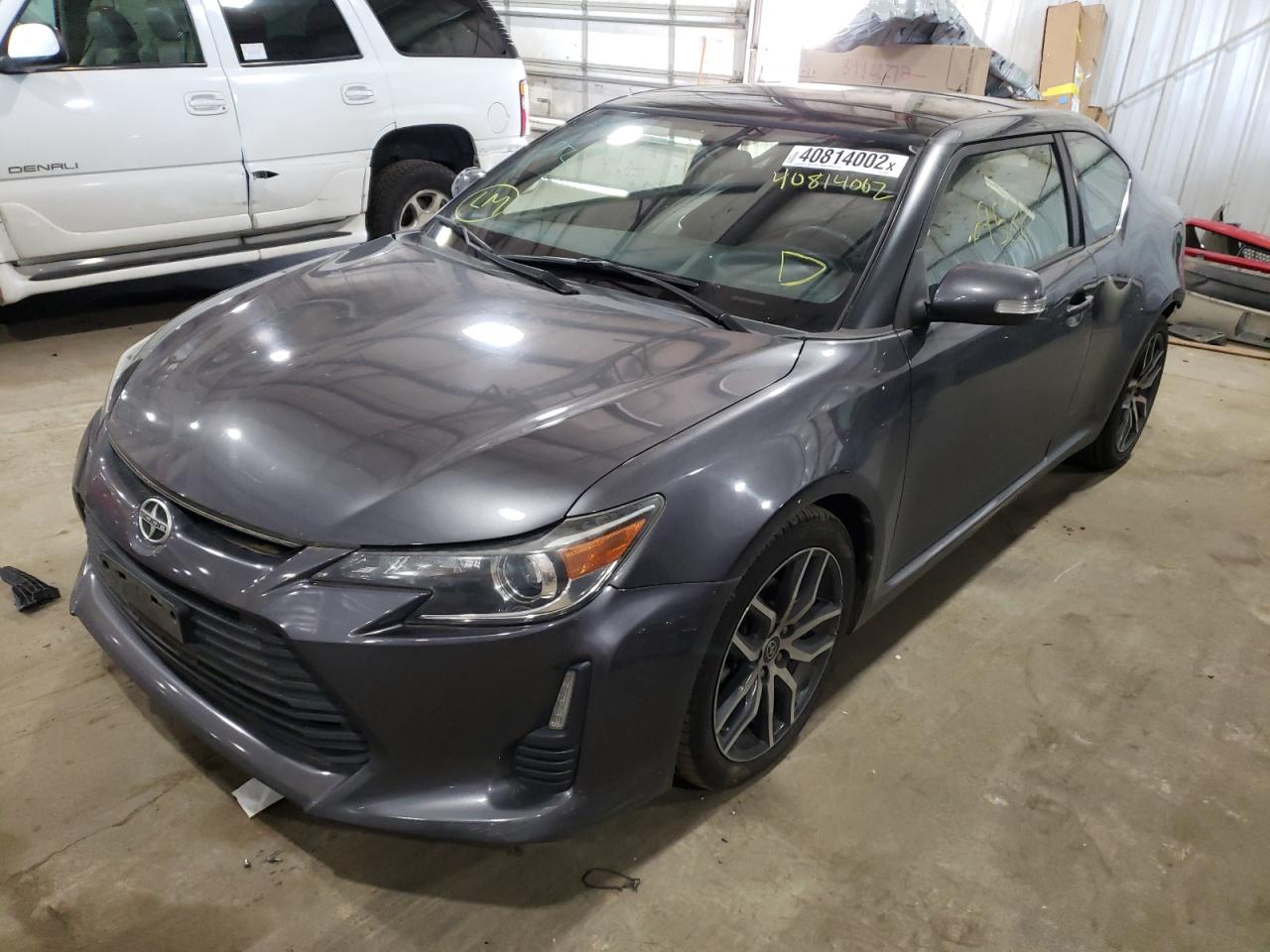 Photo 2 from auction – 2016 TOYOTA SCION TC with VIN JTKJF5C75GJ022338