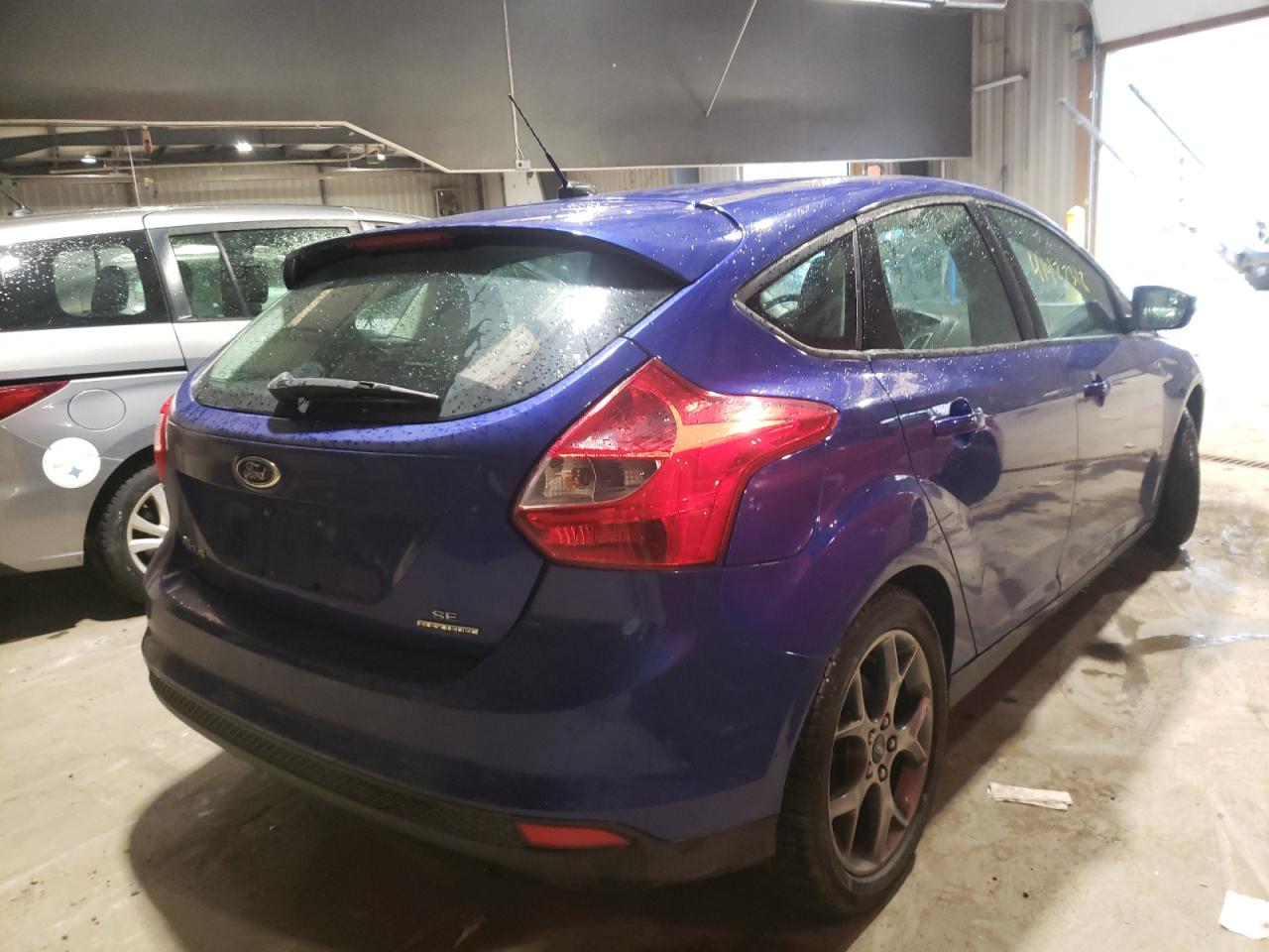 Photo 4 from auction – 2014 FORD FOCUS SE with VIN 1FADP3K28EL333121