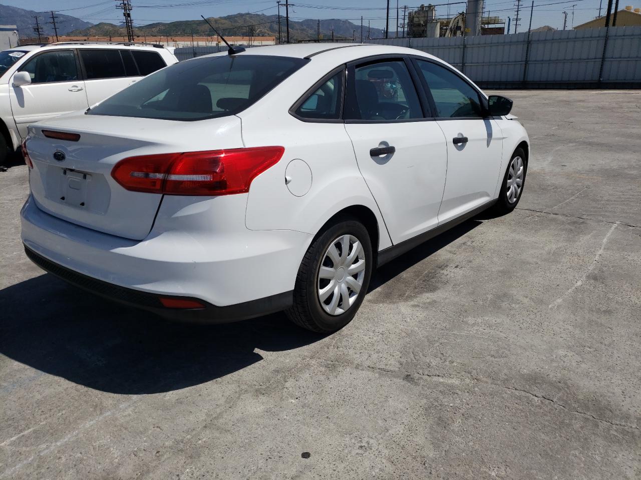 Photo 4 from auction – 2016 FORD FOCUS S with VIN 1FADP3E28GL320724