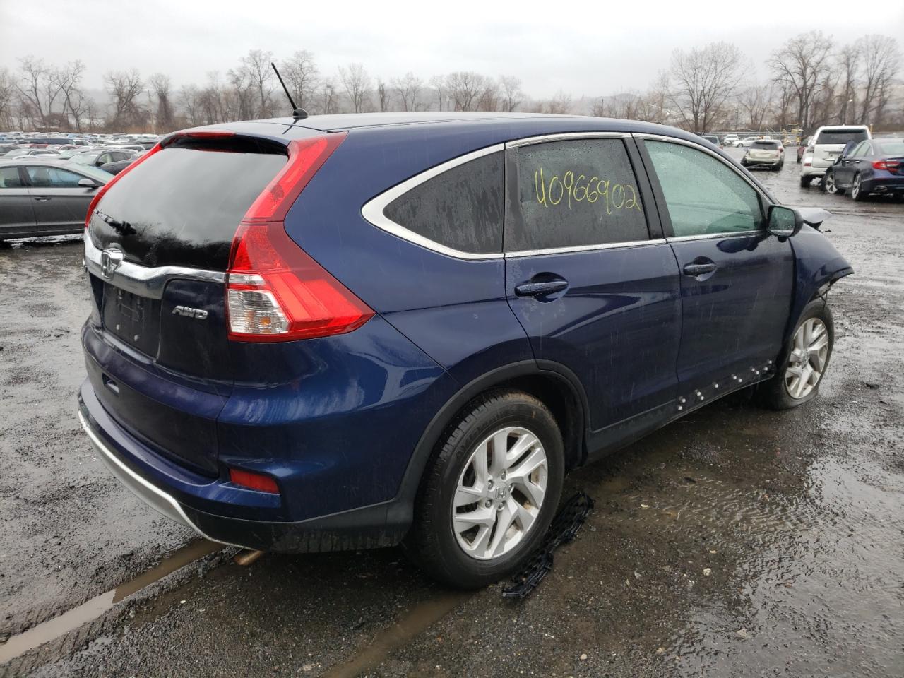 Photo 4 from auction – 2016 HONDA CR-V EX with VIN 2HKRM4H58GH712854