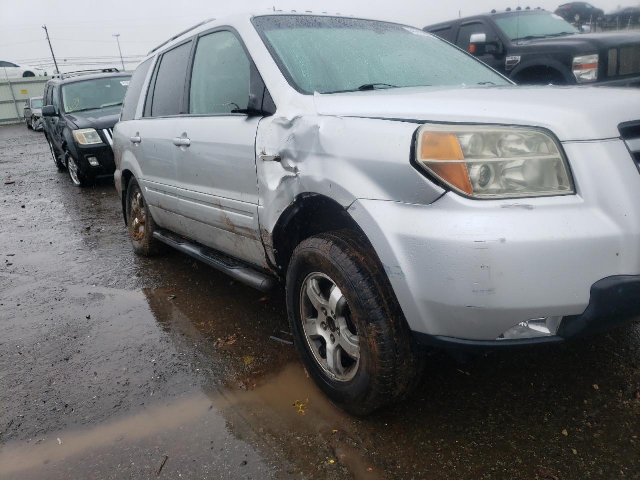 Photo 9 from auction – 2006 HONDA PILOT EX with VIN 5FNYF18696B016093