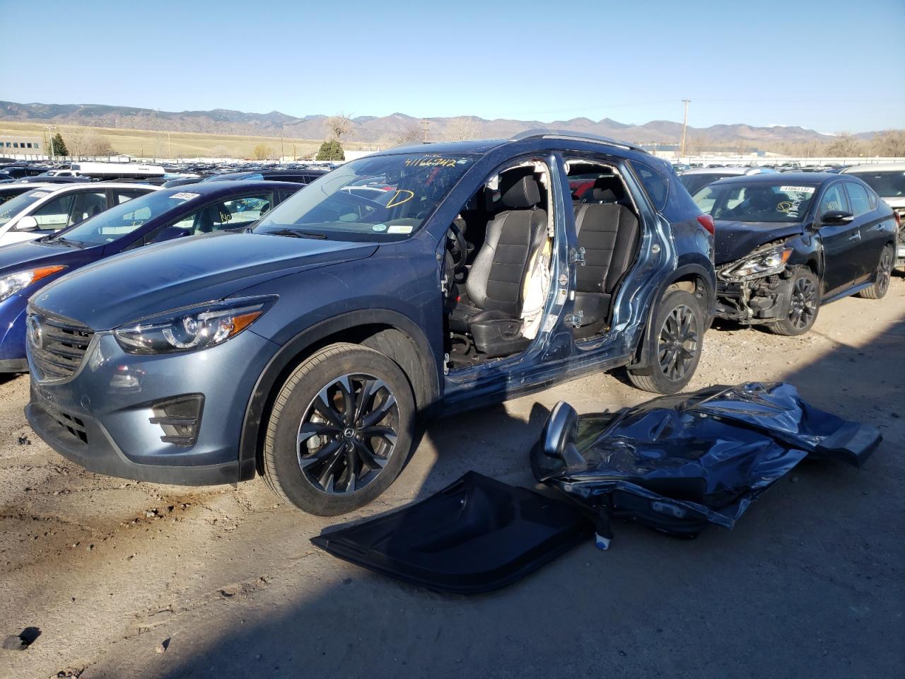 Photo 2 from auction – 2016 MAZDA CX-5 GT with VIN JM3KE4DY8G0674044