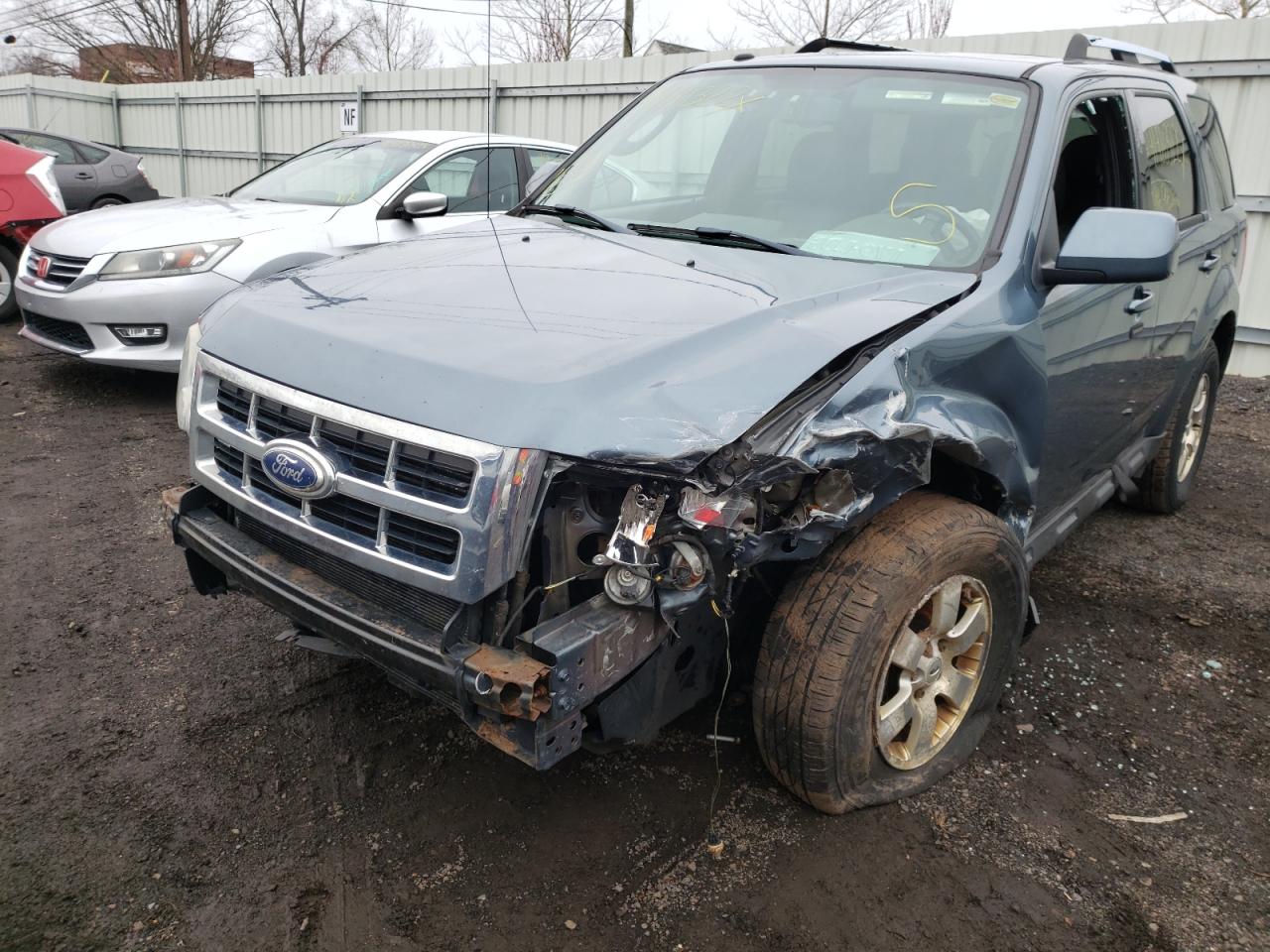 Photo 9 from auction – 2010 FORD ESCAPE LIM with VIN 1FMCU9EG0AKC77924