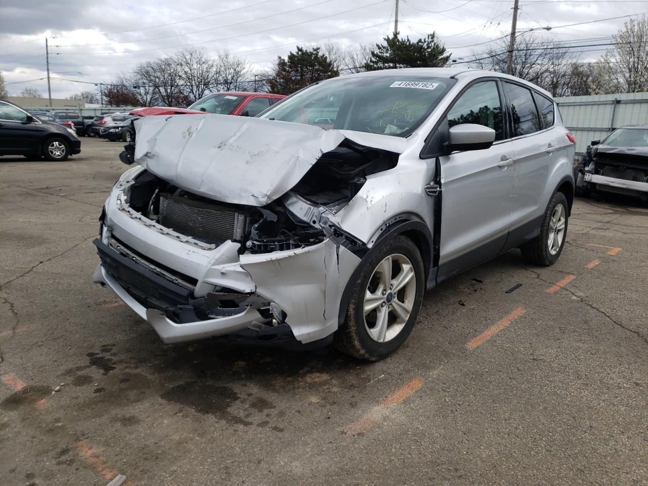 Photo 2 from auction – 2016 FORD ESCAPE SE with VIN 1FMCU0GX6GUA43809
