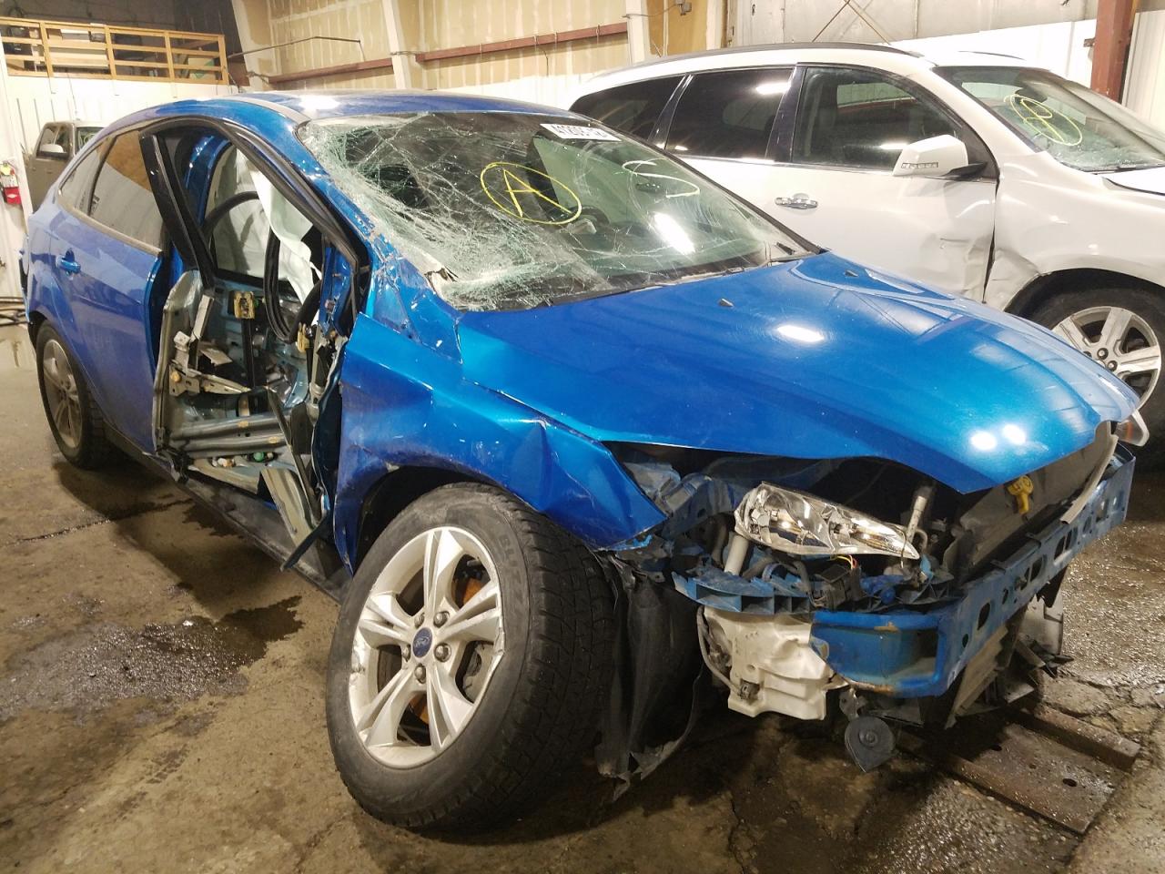 FORD FOCUS SE 2014 with VIN 1FADP3F24EL241935 - Photo from auction