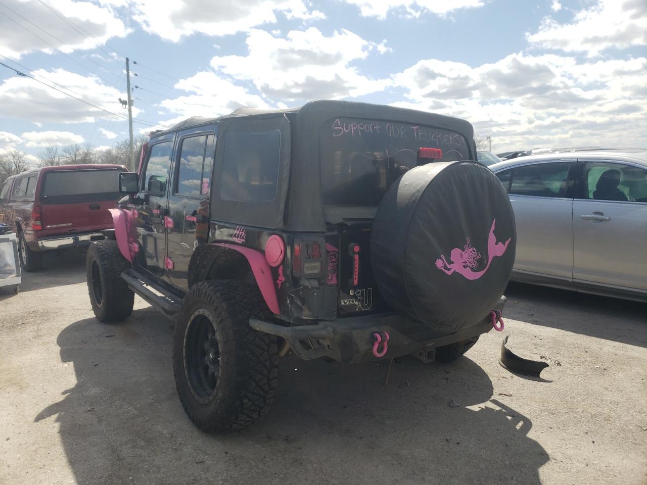 Photo 3 from auction – 2014 JEEP WRANGLER U with VIN 1C4BJWDG8EL130405