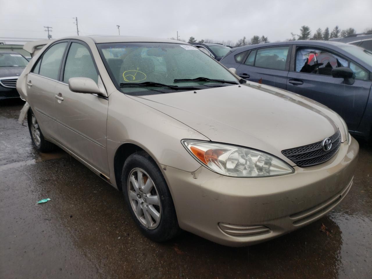 TOYOTA CAMRY LE 2002 with VIN JTDBF30KX20083983 - Photo from auction