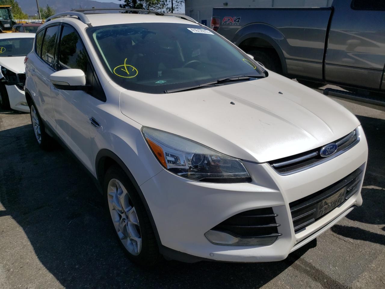 FORD ESCAPE TIT 2014 with VIN 1FMCU0J94EUB16361 - Photo from auction
