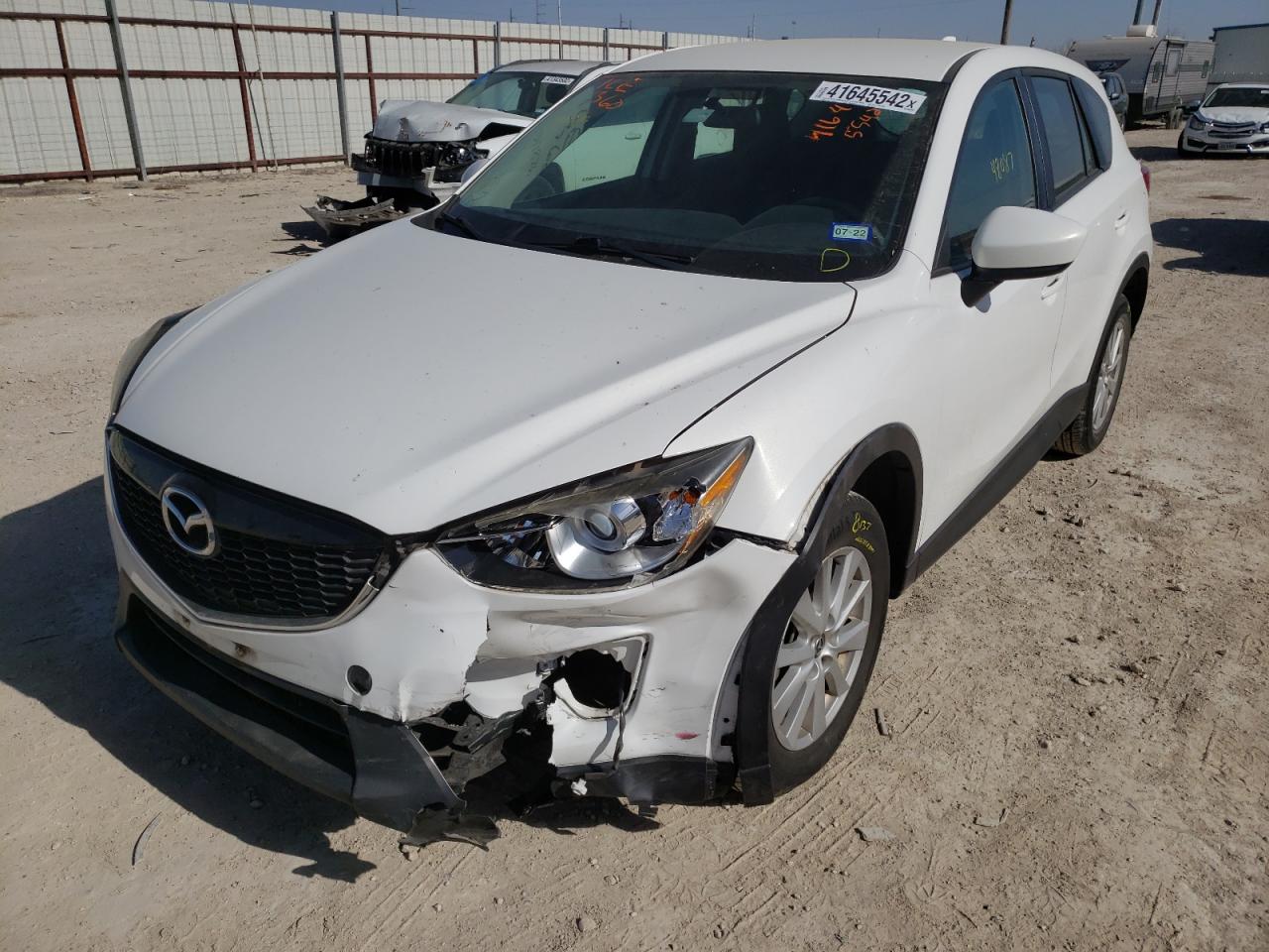 Photo 2 from auction – 2014 MAZDA CX-5 SPORT with VIN JM3KE2BE4E0347876