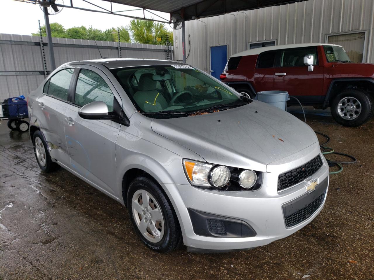 CHEVROLET SONIC LS 2015 with VIN 1G1JB5SH6F4117784 - Photo from auction
