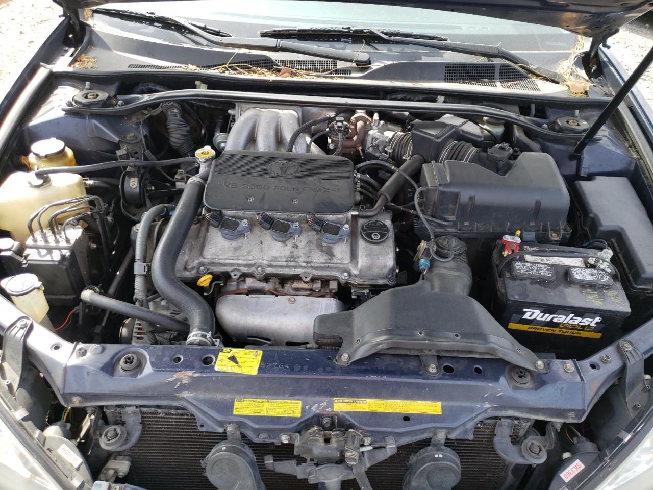 Photo 7 from auction – 2002 TOYOTA CAMRY LE with VIN 4T1BF30KX2U506095