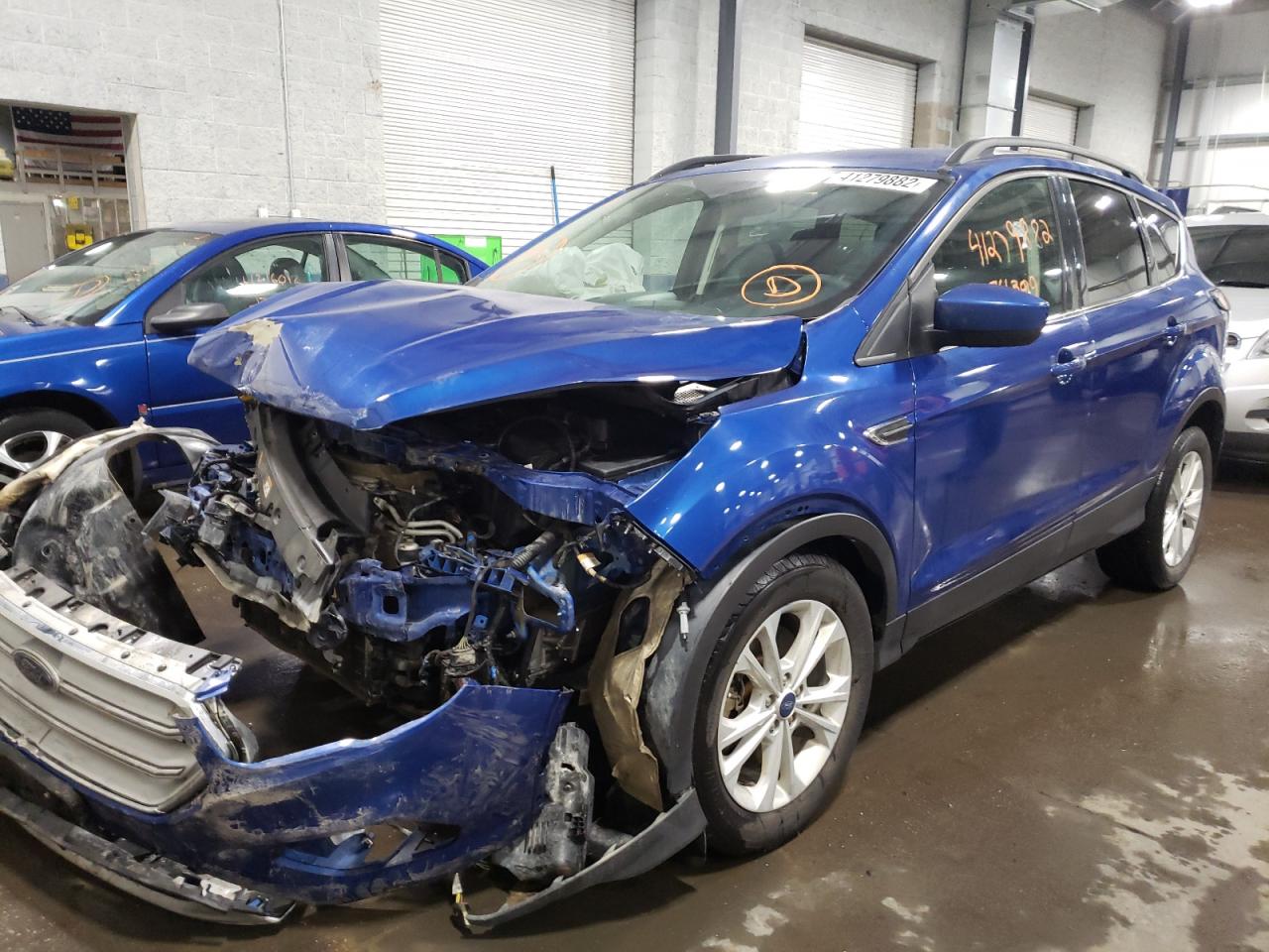 Photo 2 from auction – 2018 FORD ESCAPE SE with VIN 1FMCU9GD6JUA13789