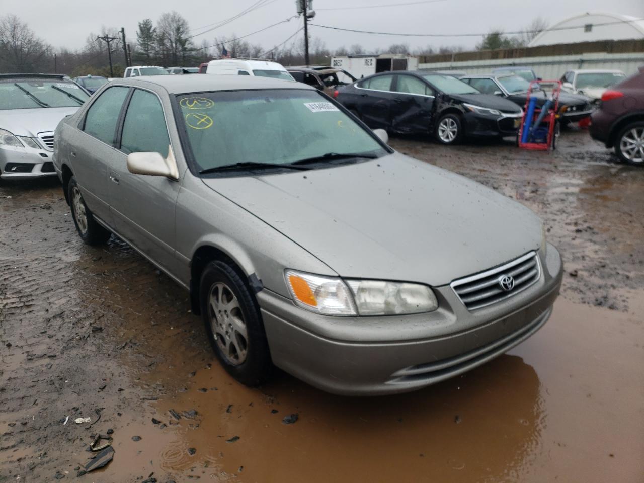 TOYOTA CAMRY CE 2000 with VIN JT2BG22K8Y0477102 - Photo from auction