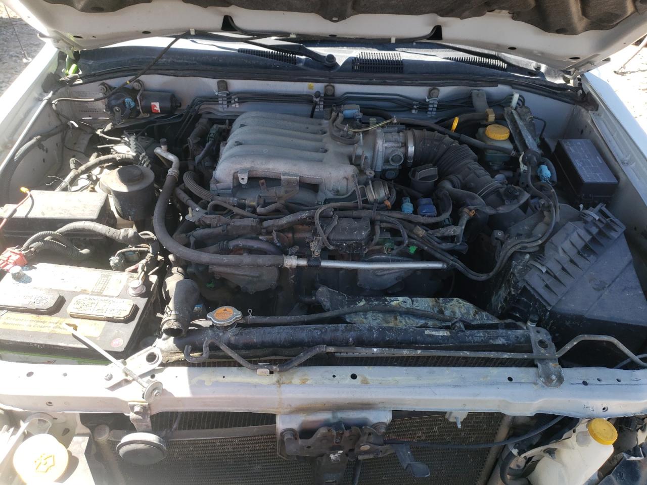 Photo 7 from auction – 2004 NISSAN PATHFINDER with VIN JN8DR09Y74W921042