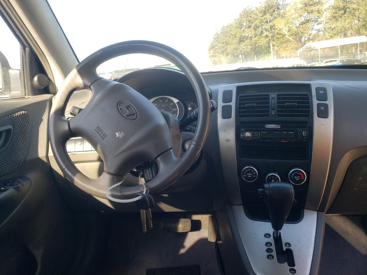 Photo 9 from auction – 2007 HYUNDAI TUCSON SE with VIN KM8JN12D07U582935