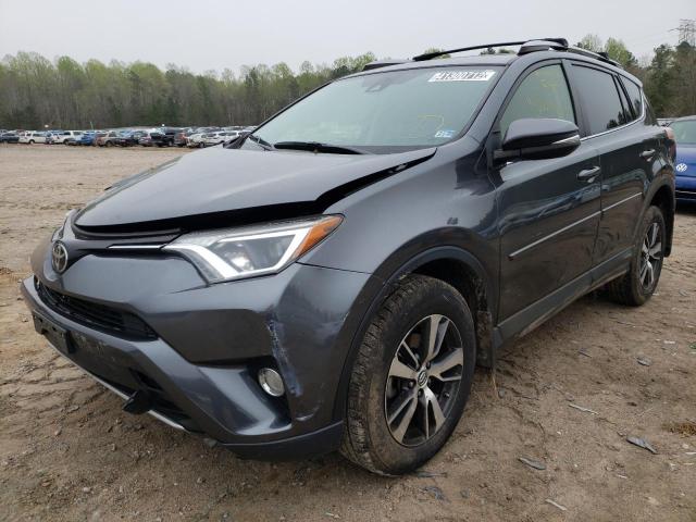 Photo 2 from auction – 2017 TOYOTA RAV4 XLE with VIN JTMRFREV9HD210504
