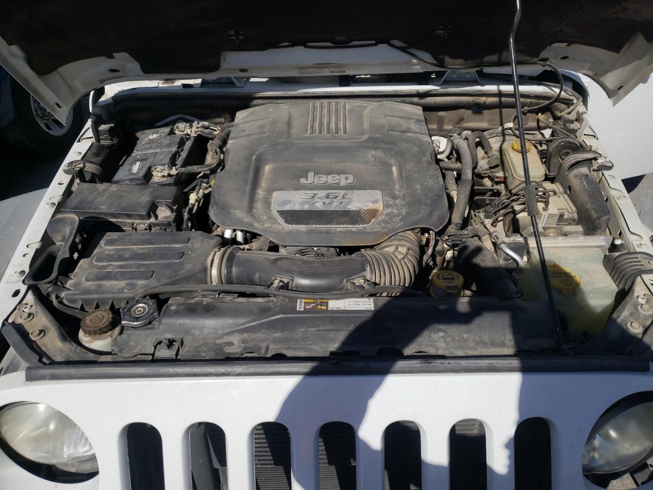 Photo 7 from auction – 2013 JEEP WRANGLER U with VIN 1C4BJWFG0DL599595