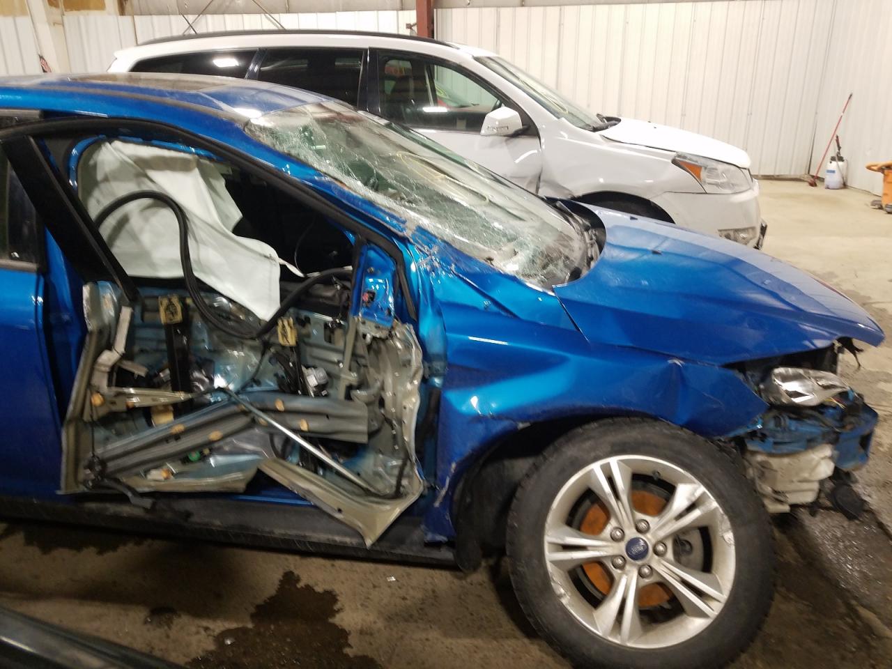 Photo 9 from auction – 2014 FORD FOCUS SE with VIN 1FADP3F24EL241935
