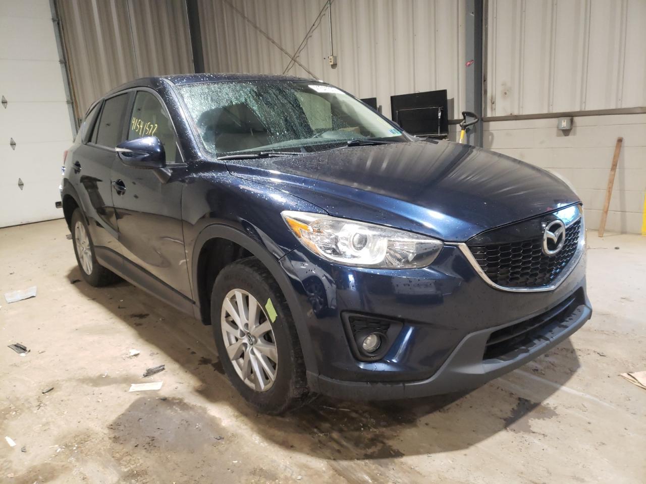 MAZDA CX-5 TOURI 2015 with VIN JM3KE4CY2F0506772 - Photo from auction