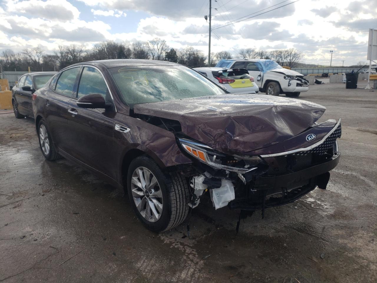KIA OPTIMA EX 2016 with VIN 5XXGU4L33GG023197 - Photo from auction