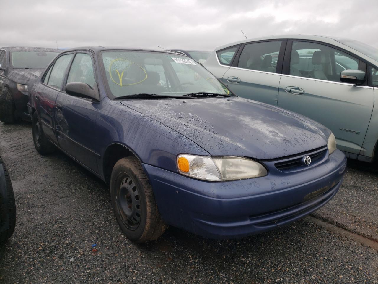 TOYOTA COROLLA VE 1999 with VIN 2T1BR12E5XC113309 - Photo from auction