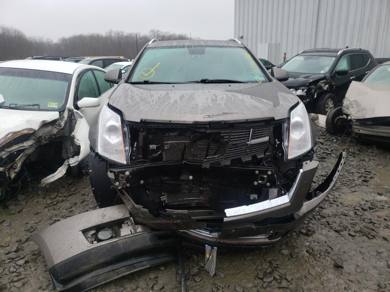 Photo 9 from auction – 2011 CADILLAC SRX PERFOR with VIN 3GYFNBEY0BS672488