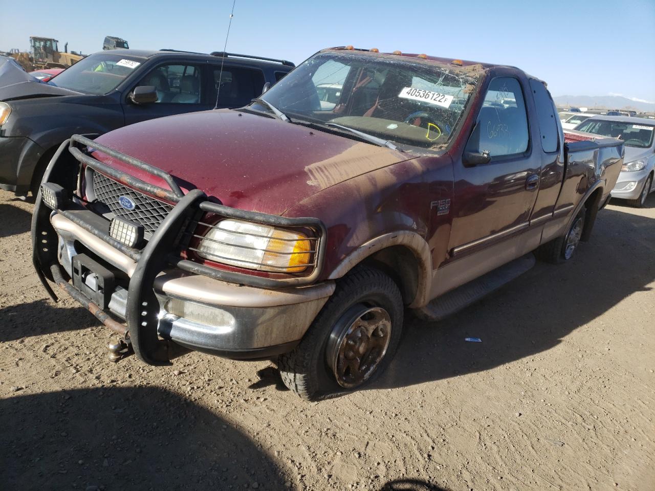 Photo 2 from auction – 1998 FORD F150 with VIN 1FTRX18L8WKA87053