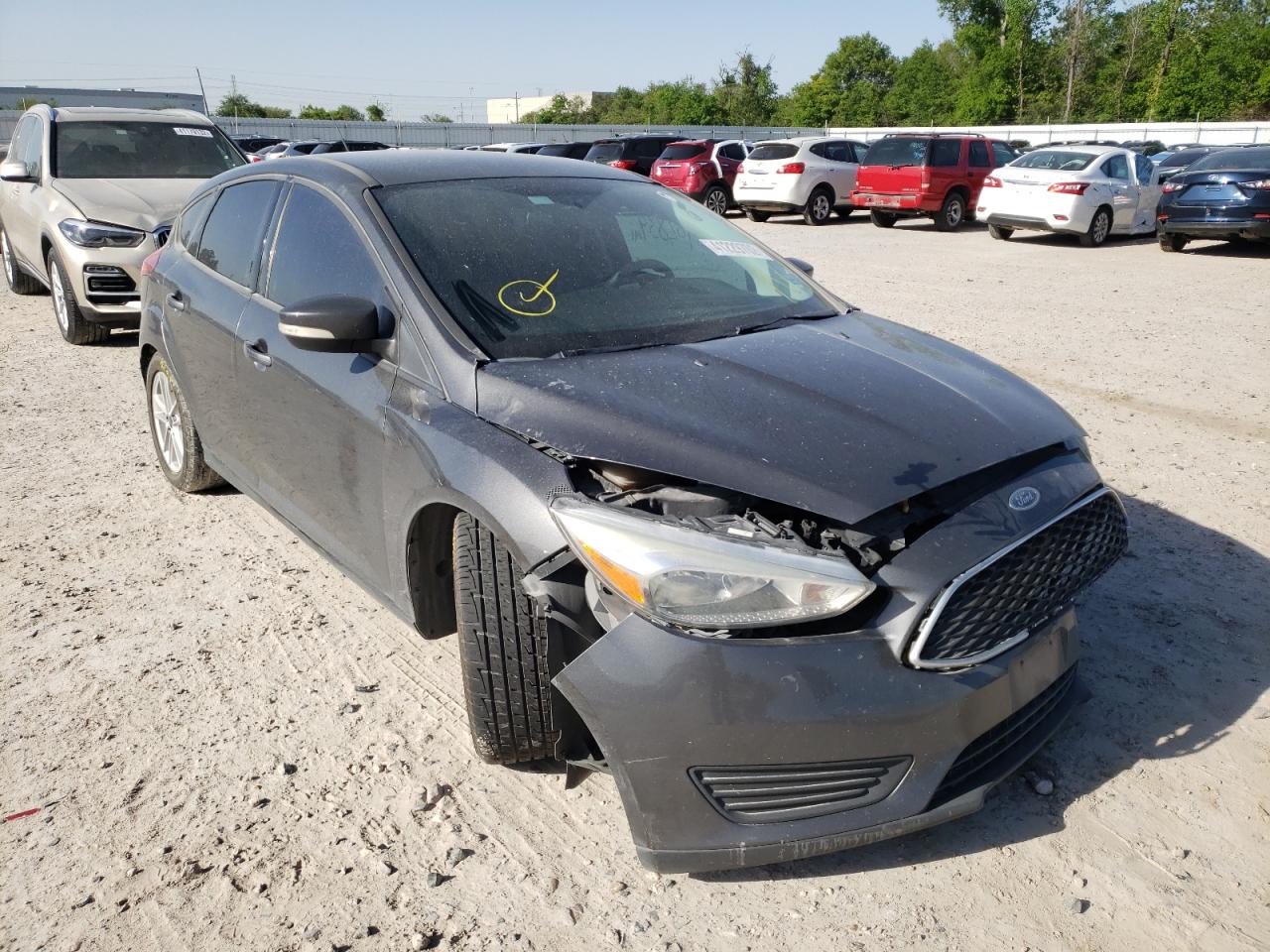 FORD FOCUS SE 2016 with VIN 1FADP3K25GL288822 - Photo from auction