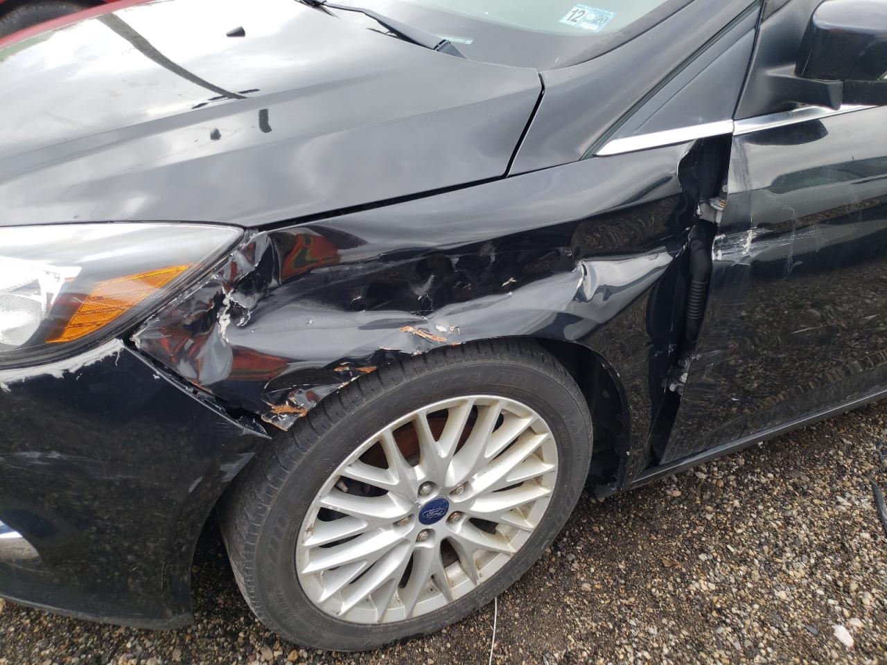 Photo 10 from auction – 2014 FORD FOCUS SE with VIN 1FADP3K27EL308565
