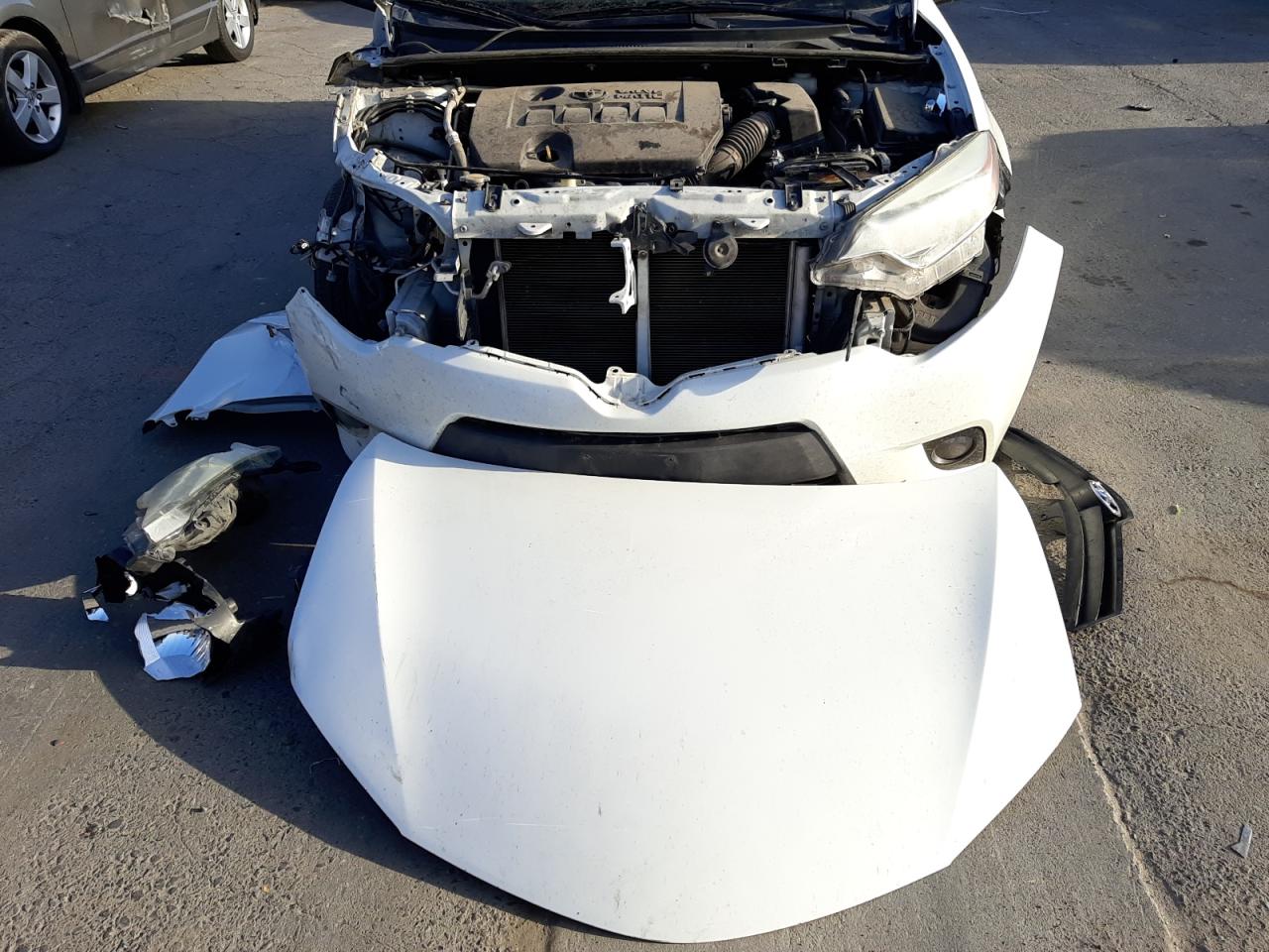 Photo 9 from auction – 2015 TOYOTA COROLLA EC with VIN 5YFBPRHEXFP343938