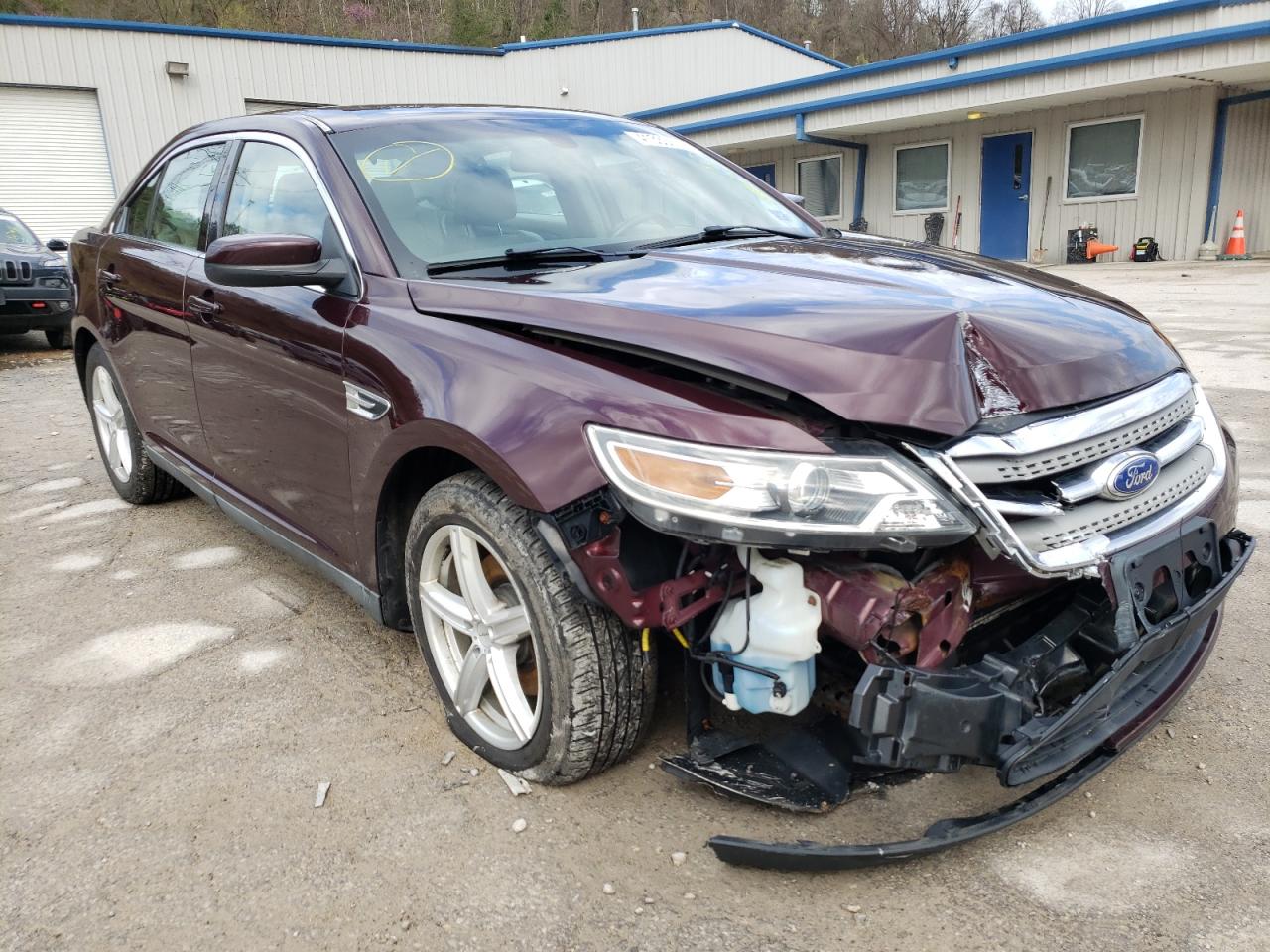 FORD TAURUS SEL 2011 with VIN 1FAHP2EW8BG165205 - Photo from auction