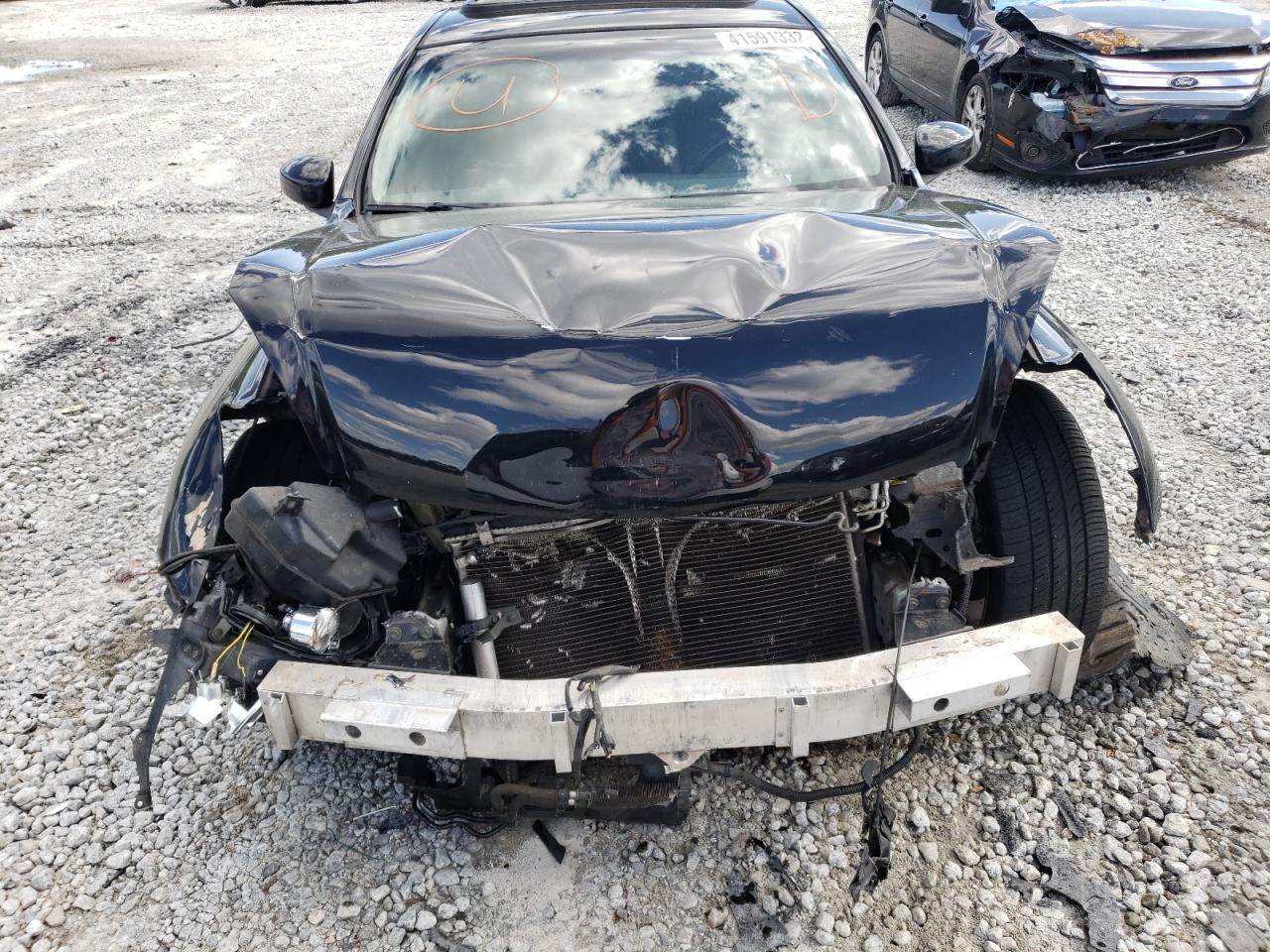 Photo 9 from auction – 2006 INFINITI G35 with VIN JNKCV54E96M706871