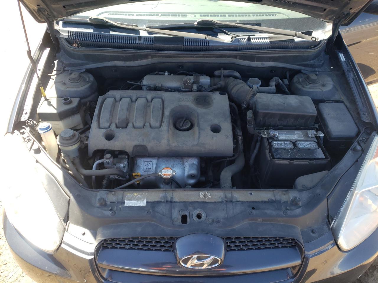 Photo 7 from auction – 2010 HYUNDAI ACCENT BLU with VIN KMHCM3AC2AU162990