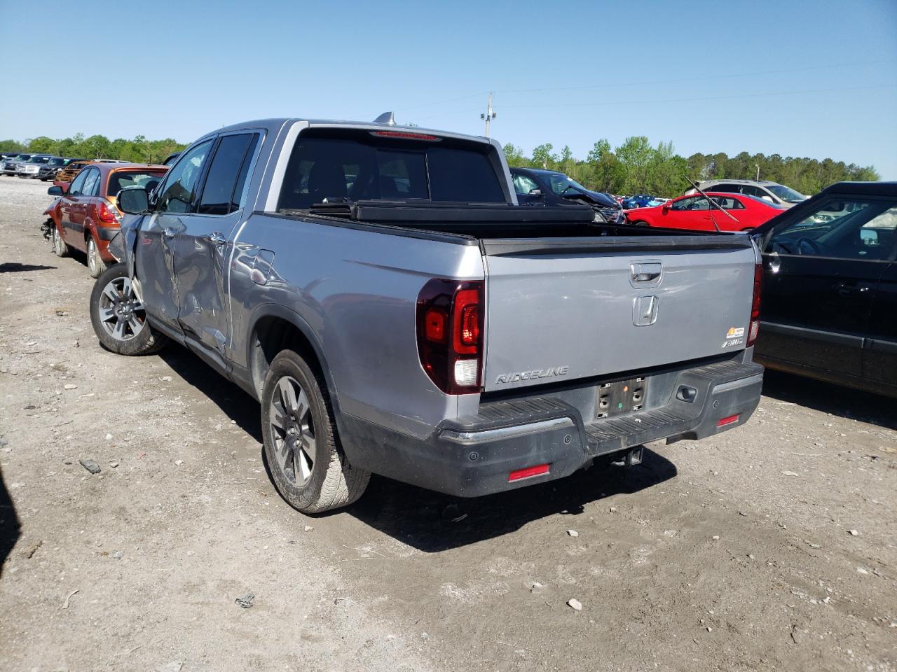 Photo 3 from auction – 2017 HONDA RIDGELINE with VIN 5FPYK3F73HB011856