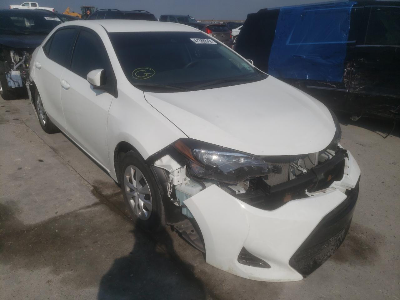 TOYOTA COROLLA 2019 with VIN 5YFBURHE4KP913810 - Photo from auction