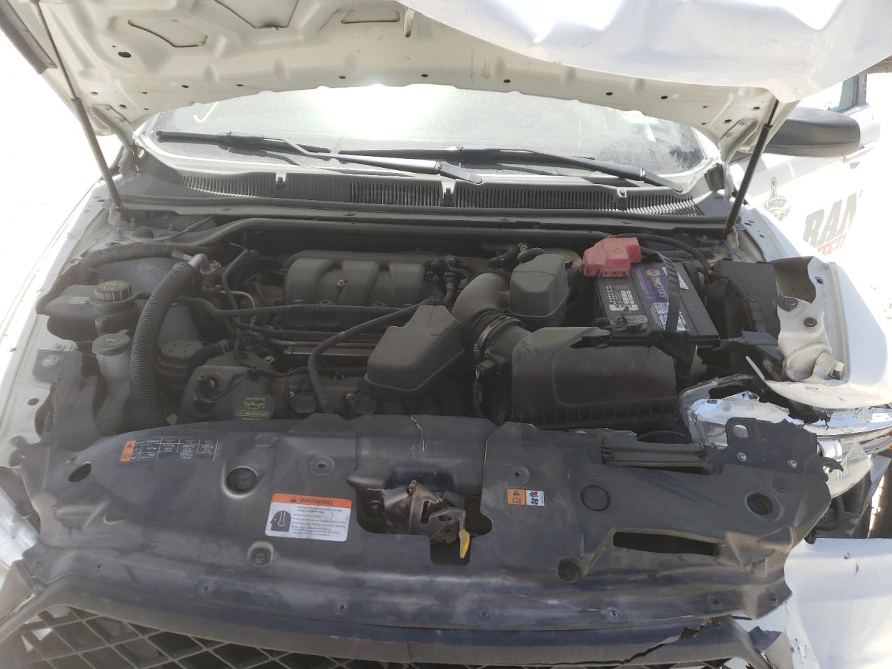 Photo 7 from auction – 2013 FORD TAURUS POL with VIN 1FAHP2L89DG119650