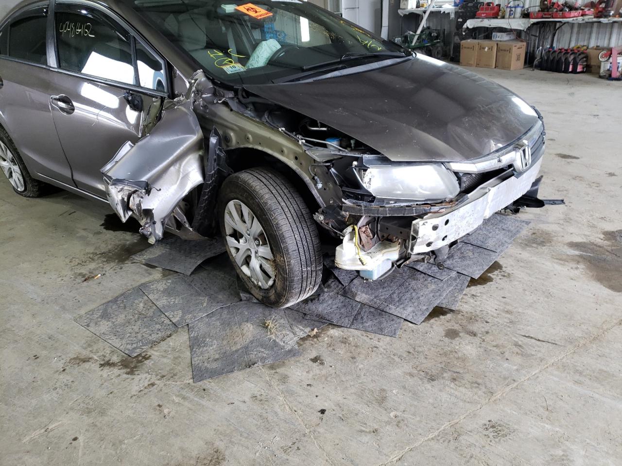 Photo 9 from auction – 2012 HONDA CIVIC LX with VIN 2HGFB2F54CH588747